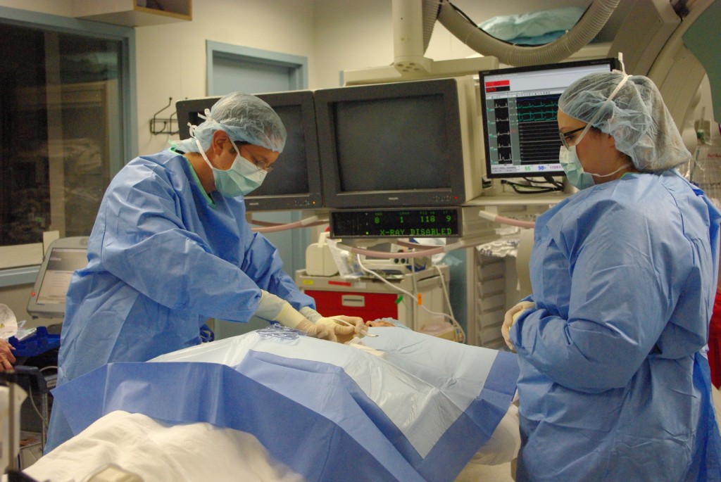 SLUCare electrophysiologist Scott Ferrierra, MD, implants the first Reveal Linq device at Saint Louis University Hospital, February 24, 2014.